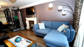 Spacious 4-Bedroom Home with Garden & Free Parking